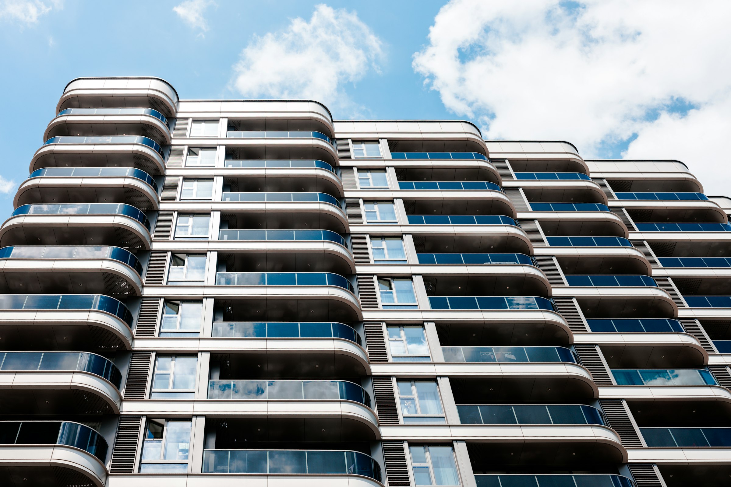 Ir Yamim Residences - contemporary facade with wraparound balconies